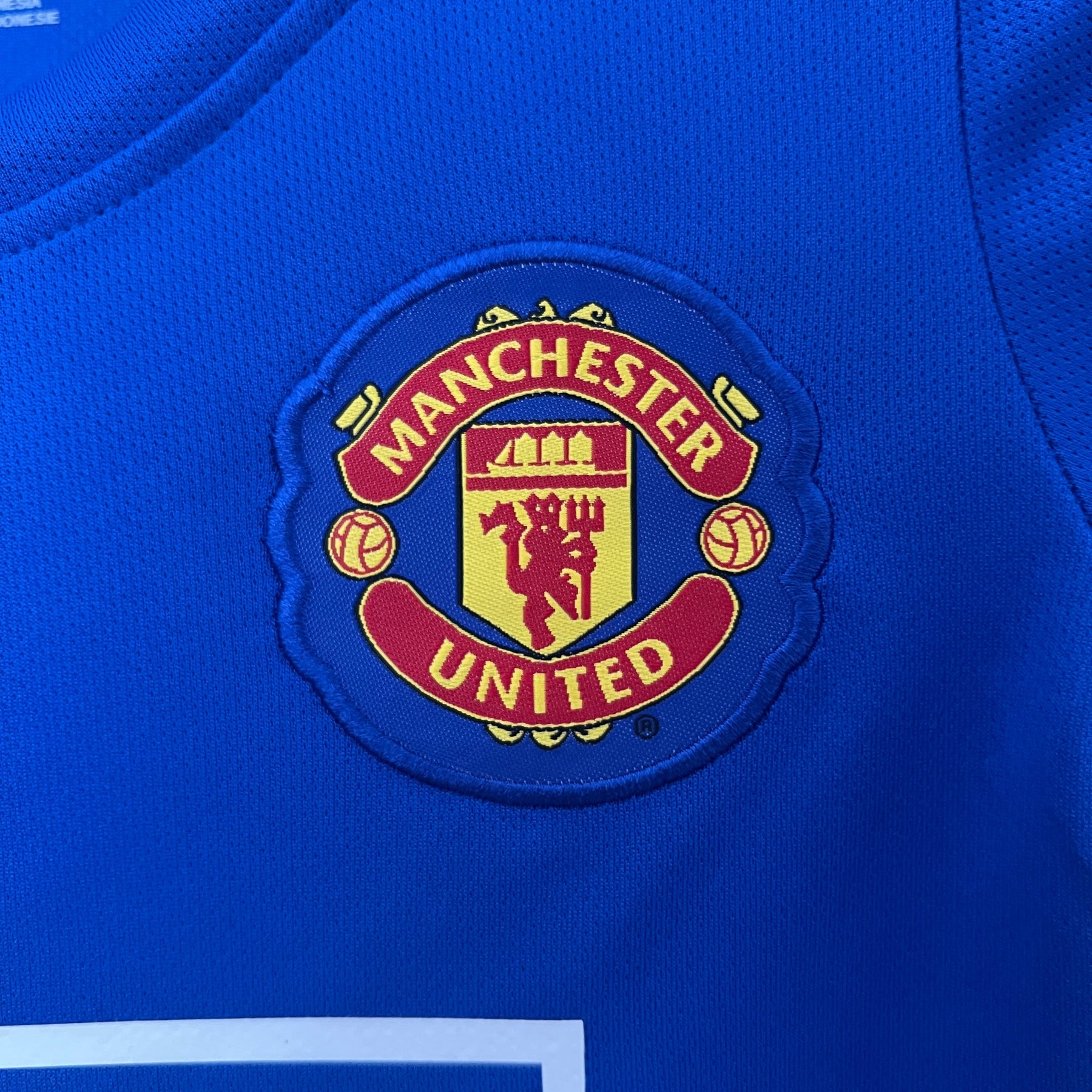 KIT INFANTIL RETRÔ MANCHESTER UNITED BLUE 08/09